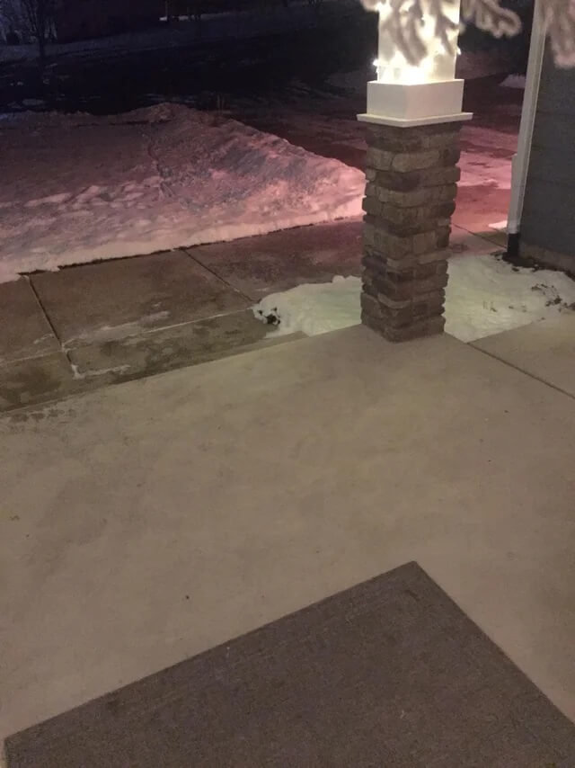 The snow outside my porch looks like a polar bear's face