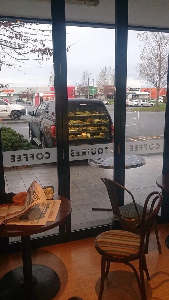 Mirage of the coffee shop window makes it look like this car sells pies out of the boot