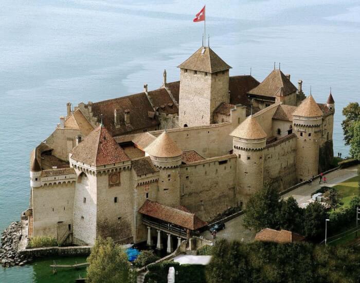 Real-Life Places Inspiring Disney Movies, Eric's Castle In 'The Little Mermaid' & Château de Chillon In Switzerland
