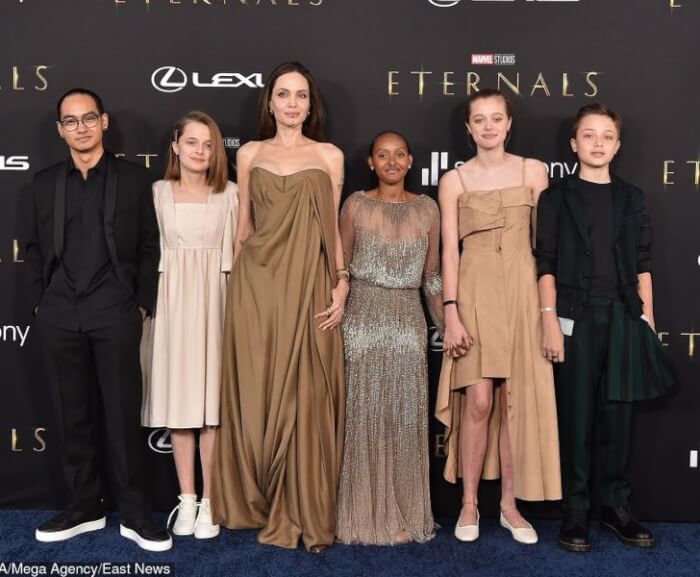 Celebrities Who Prove You Can't Stop Being A Mom Or Dad, Angelina Jolie with five of her children