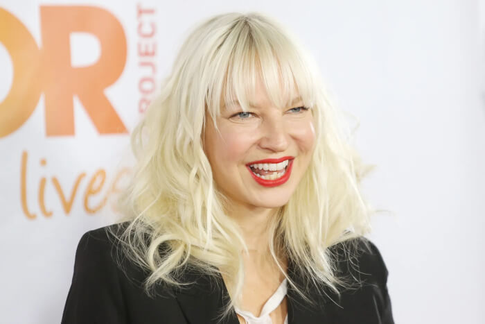 Why Does Sia Cover Her Face