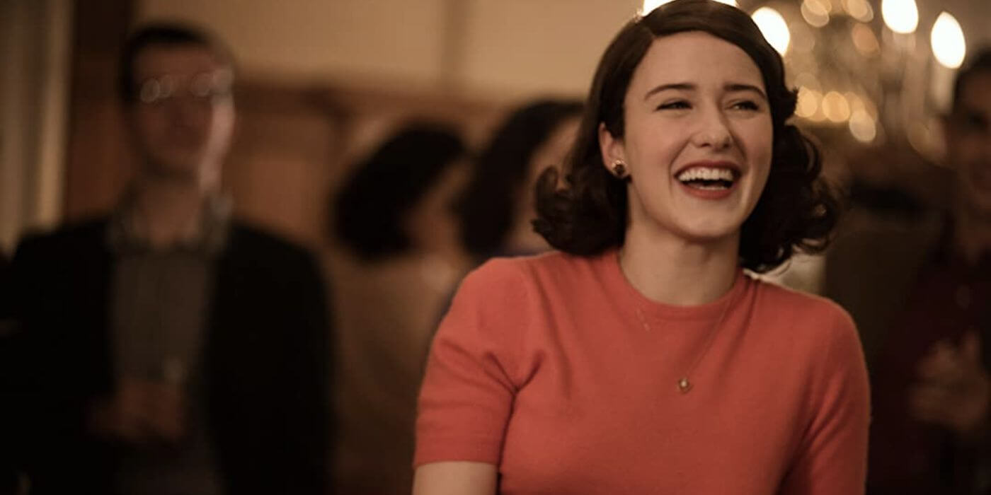 Mrs. Maisel is smiling