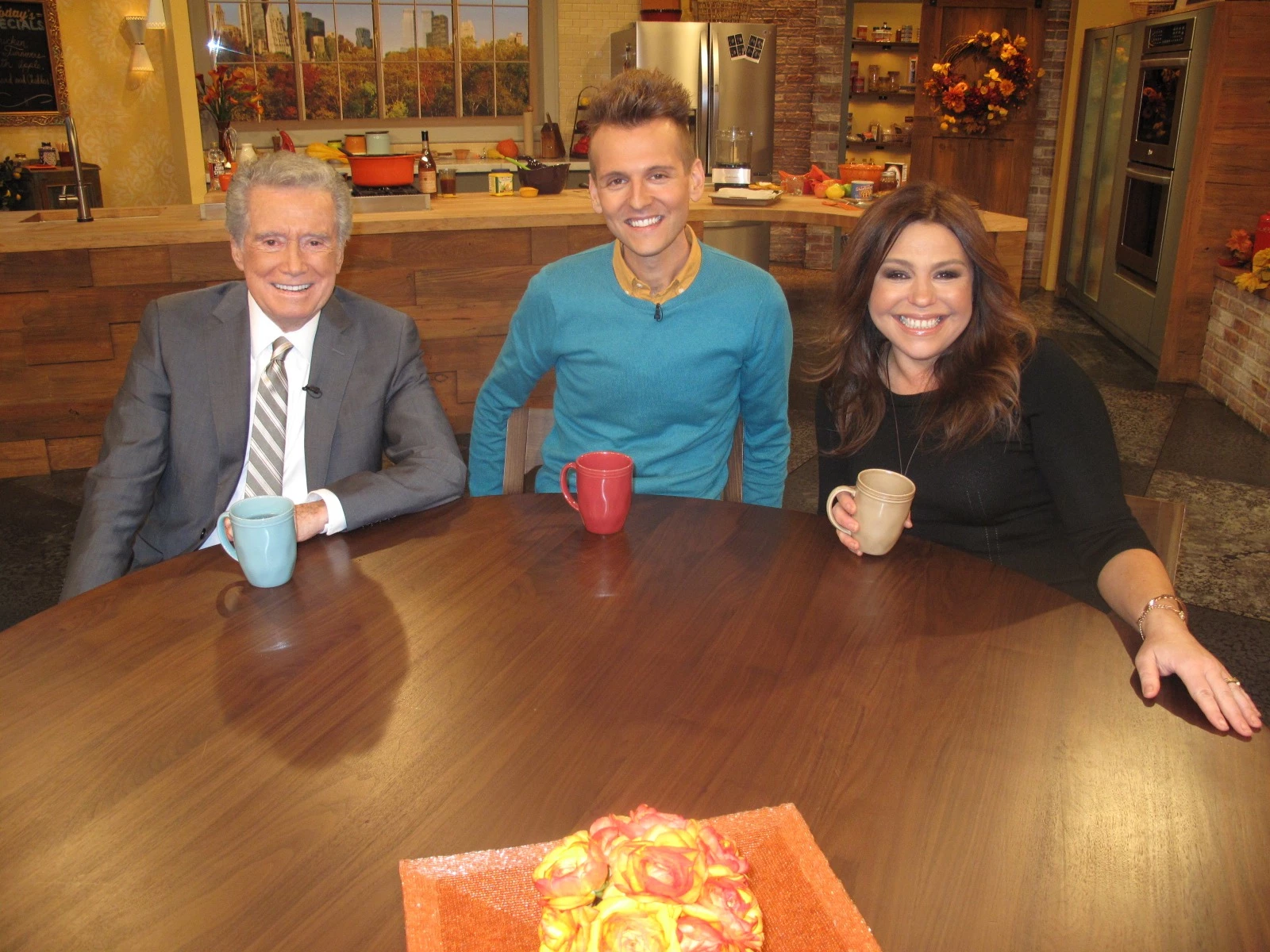 Kaleb Wyse with Rachael Ray and Regis Philbin, who offered tips on how to be a good talk show host.