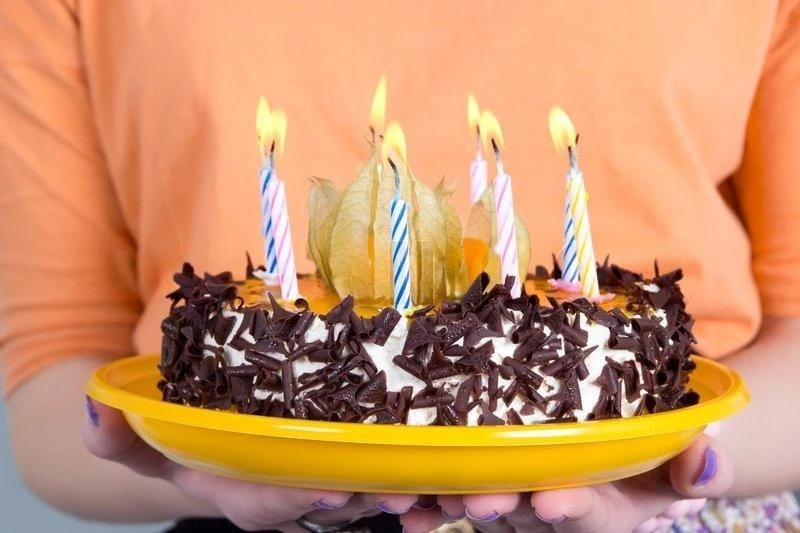 Woman left her stepdaughter's birthday party after her husband threw out the birthday cake she baked