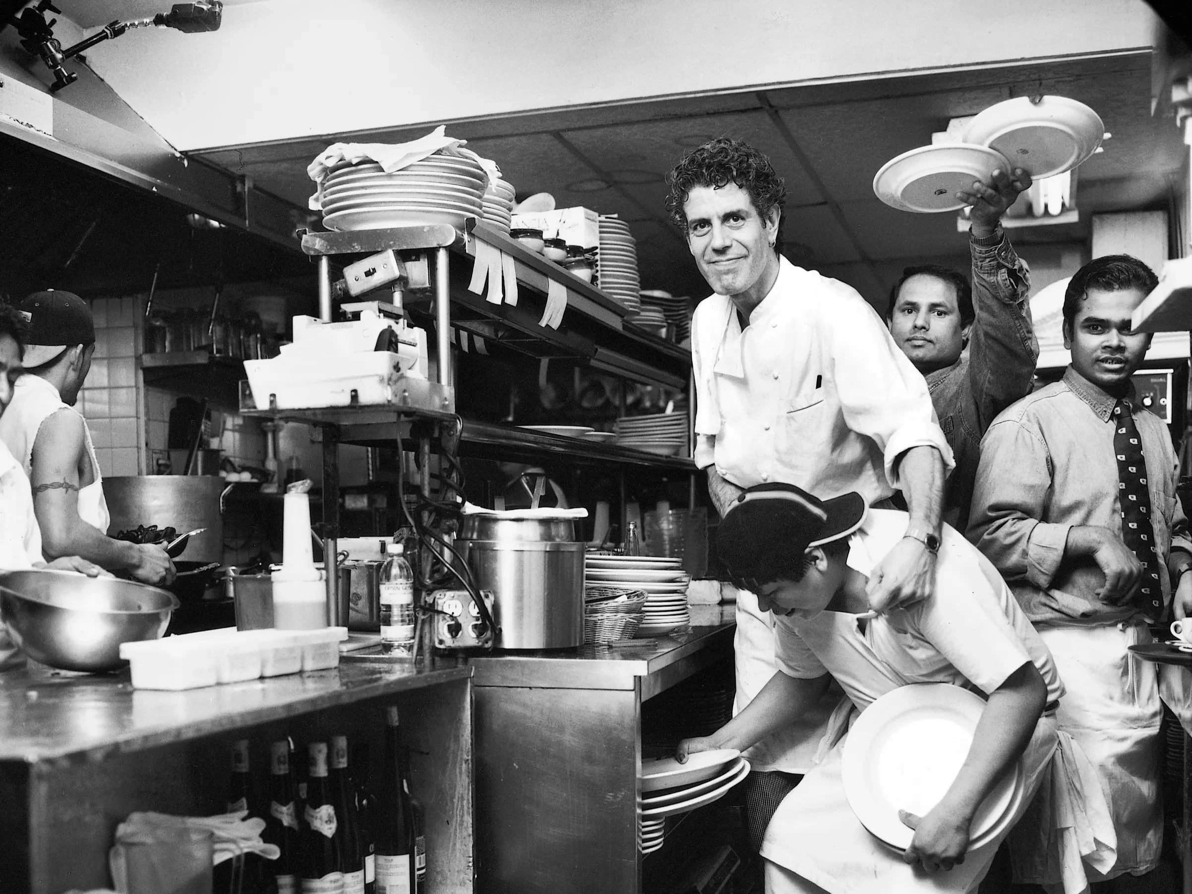 Bourdain with his staff member