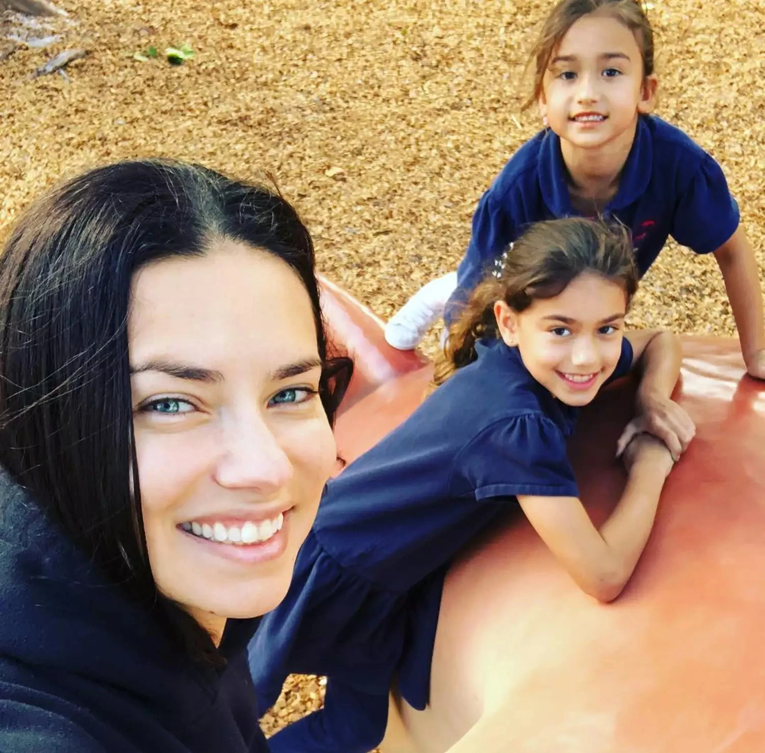 Adriana Lima with her children