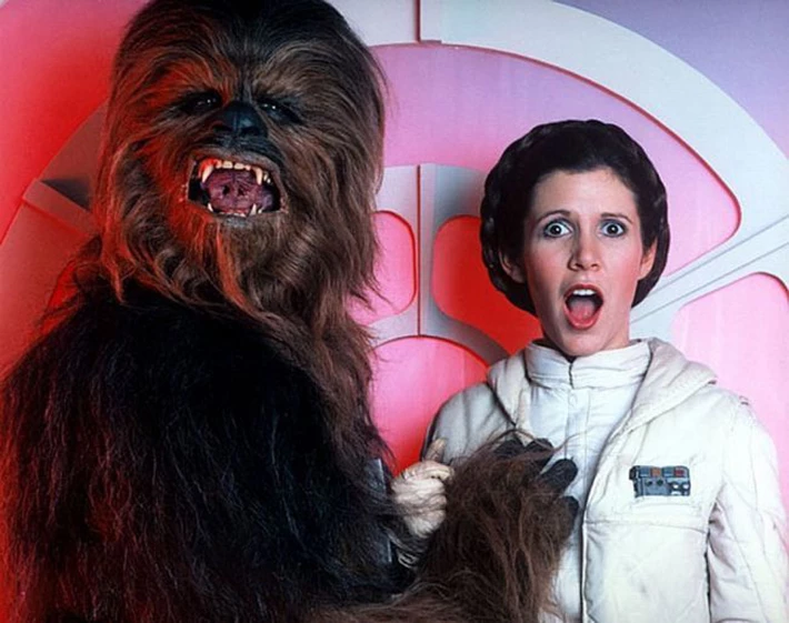 Chewbacca getting a bit frisky during one of the funnier outtakes.