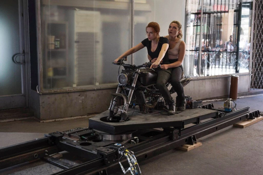 Natasha and Elena Belova escape from their pursuers. I wonder what model of motorcycle it is.