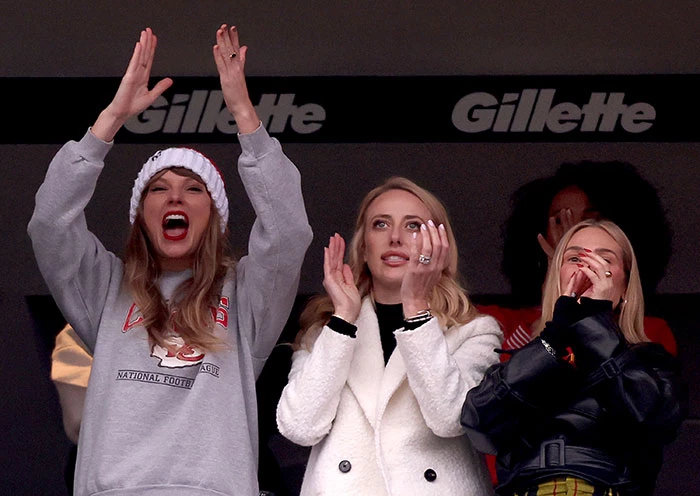Taylor was spotted with Brittany Mahomes and Ashley Avignone at Gillette Stadium on December 17th, cheering after a Kansas City Chiefs touchdown.