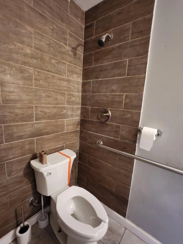 With This Bathroom, You Can Shower While Taking A Crap At The Same Time!