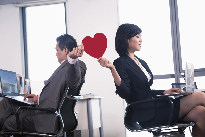 Would You Rather: Get Your Dream Promotion Or Date Your Smoking-Hot Colleague?